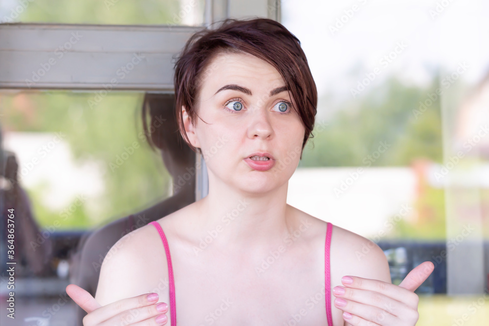 A girl with a surprised expression on her face
