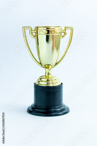 winner or champion gold trophy cup on white background. Victory first place of competition. Winning or success concept.