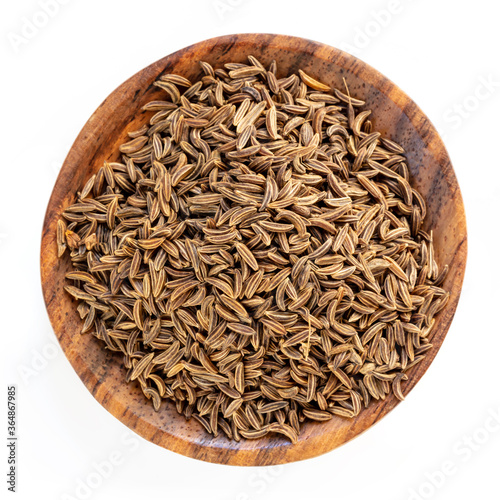 Caraway Seeds in Wooden Bowl Top View Isolated photo