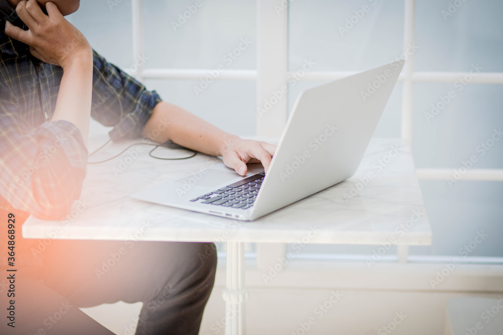 businessman working on laptop in cafe. businessman working on laptop in cafe.