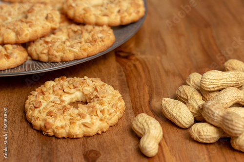 sable biscuits with chopped peanuts on top	
