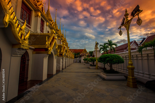Background of important religious attractions in Bangkok  Loha Prasat or Wat Ratchanatdaram  is a beautiful golden pagoda  tourists all over the world always come to see the beauty in Thailand.