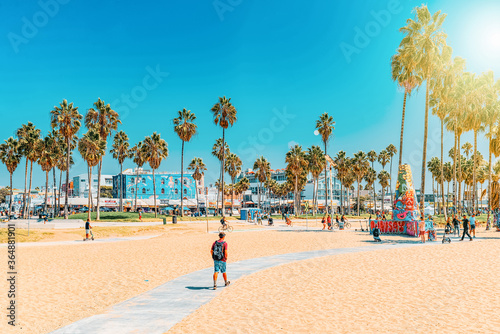 Famous Los Angeles Beach - Venice Beach with people. photo