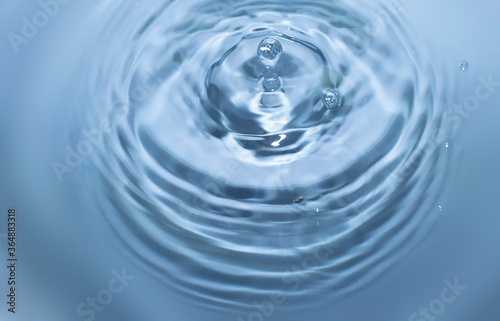 Waves and soft water droplets in a circle
