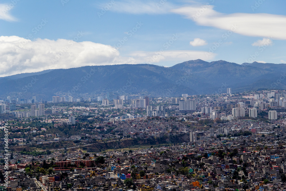 Aerial view of Mexico City west part of the valley with  a marked contrast between new luxurious developments beside old poor living districts