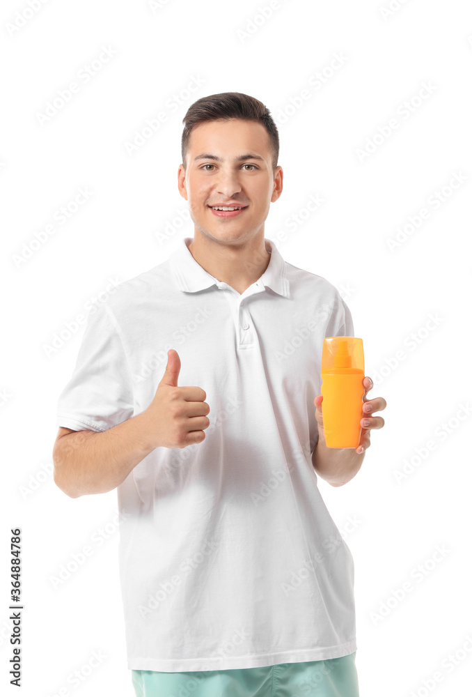 Happy young man with sun protection cream on white background Happy young man with sun protection cream on white background