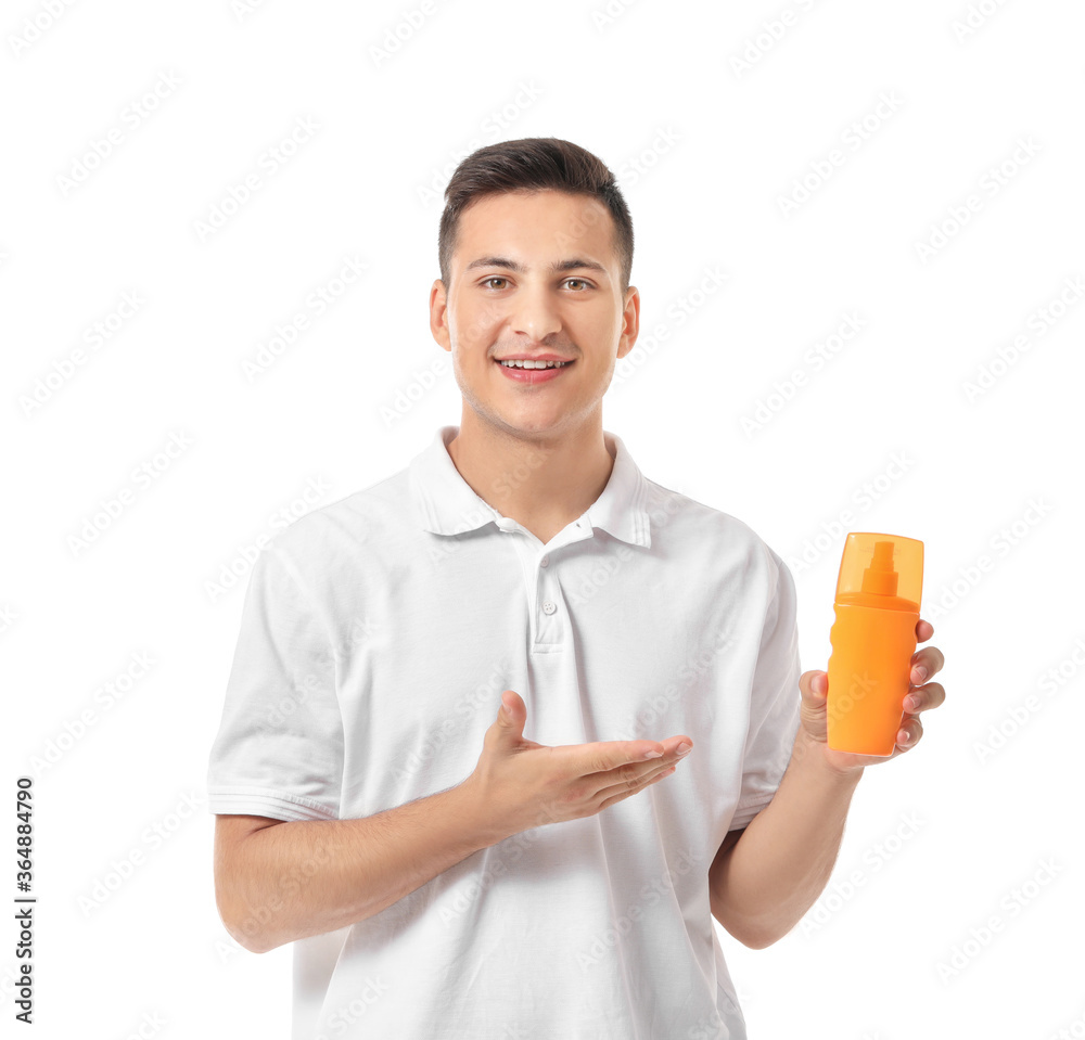 Happy young man with sun protection cream on white background Happy young man with sun protection cream on white background
