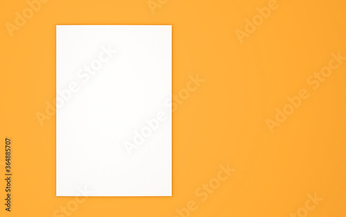 Blank book cover template isolated on yellow background. 3D rendering.