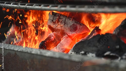close up of charcoal burning in a grill