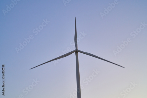 wind generators generate energy against the sky