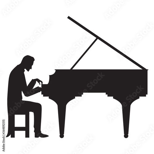 silhouette of man playing piano