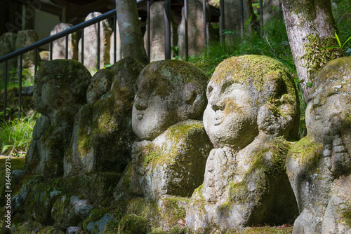 Rakan sculptures at Otagi Nenbutsu-ji Temple in Kyoto, Japan. The temple was rebuilt in 1955. photo