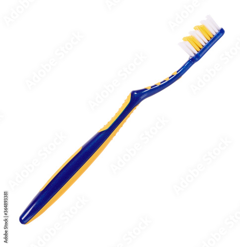 Blue and yellow plastic toothbrush  dental care. Isolated on white background.