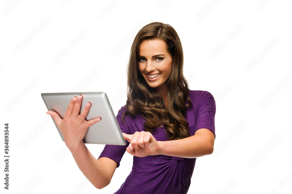 Portrait of a smiling beautiful woman holding tablet computer isolated on a white background. Looking at camera. Portrait of a smiling beautiful woman holding tablet computer isolated on a white background. Looking at camera.