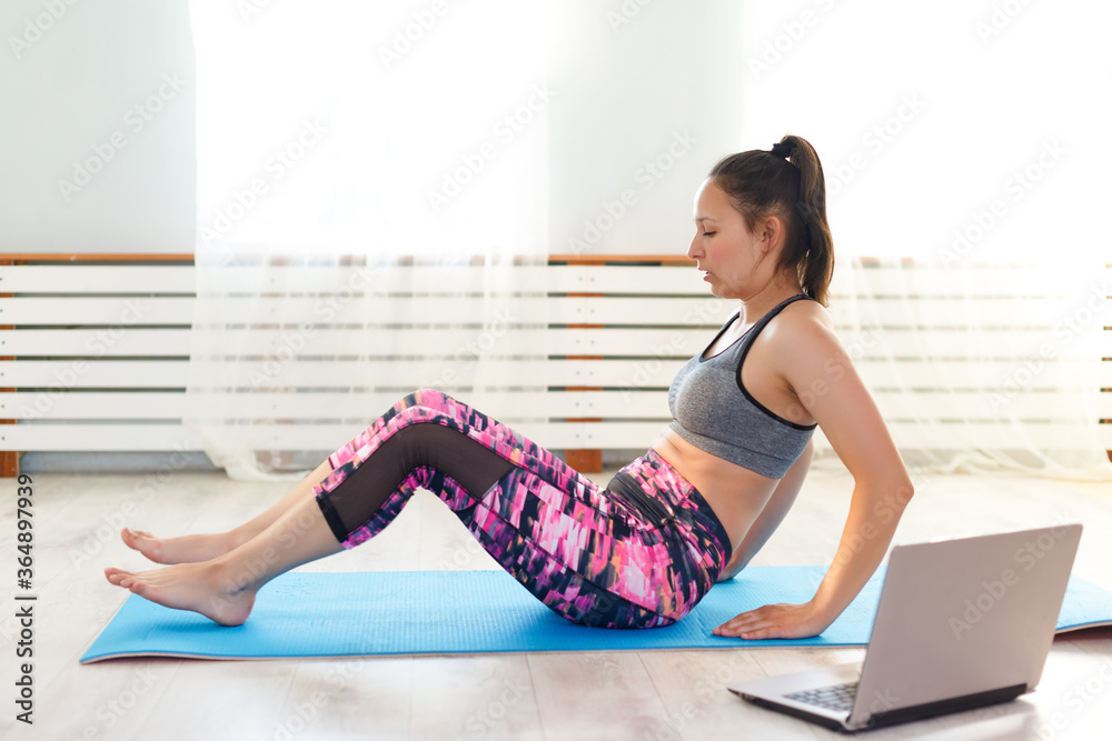 young woman doing yoga at home young woman doing yoga at home