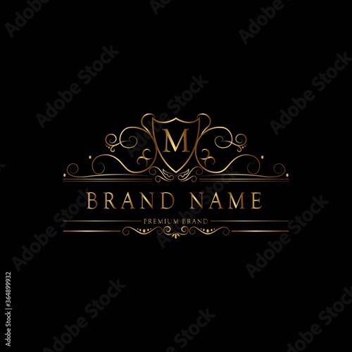 M premium luxury gold monogram logo. M letter logo. M monogram luxury gold logo.