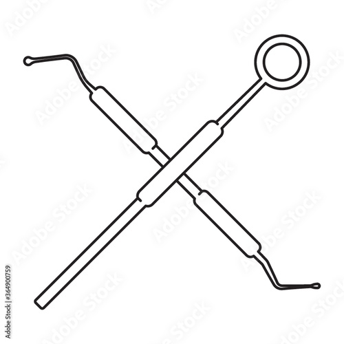 crossed dental probe and dental mirror