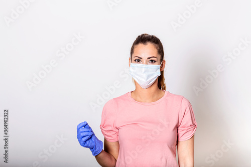 Girl with mask to protect her from Corona virus. Corona virus pandemic. Girl with medical mask to protect her from virus. People hospitalized, diagnosed, in carantine (isolation)