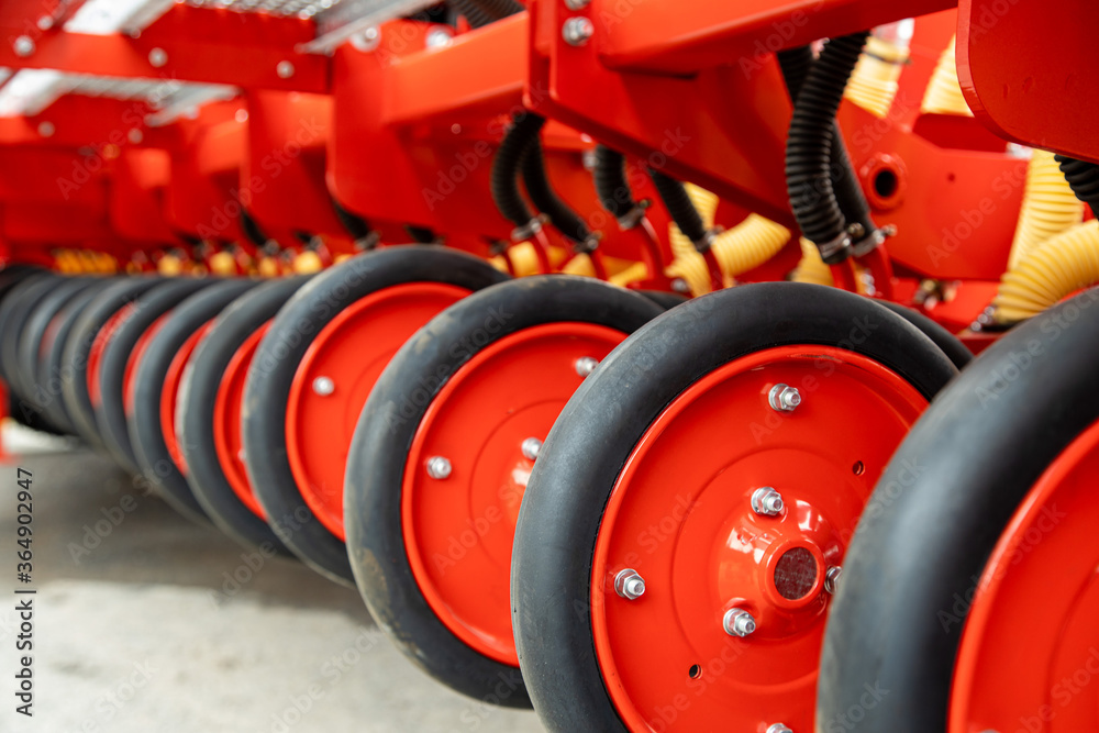 Close-up of technical units and mechanisms of agricultural machinery. Structural elements for tillage and harvesting Close-up of technical units and mechanisms of agricultural machinery. Structural elements for tillage and harvesting