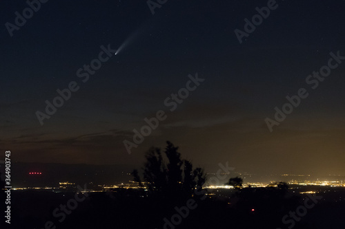 View of the comet Neowise above the town of Montélimar, France