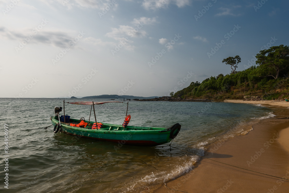 Vietnamese traditional boat at the beach in sunset. Phu Quoc island,. Vietnam