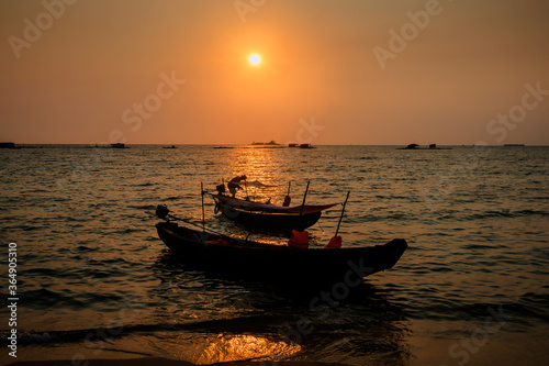 Vietnamese traditional boat at the beach in sunset. Phu Quoc island,. Vietnam © sola_sola