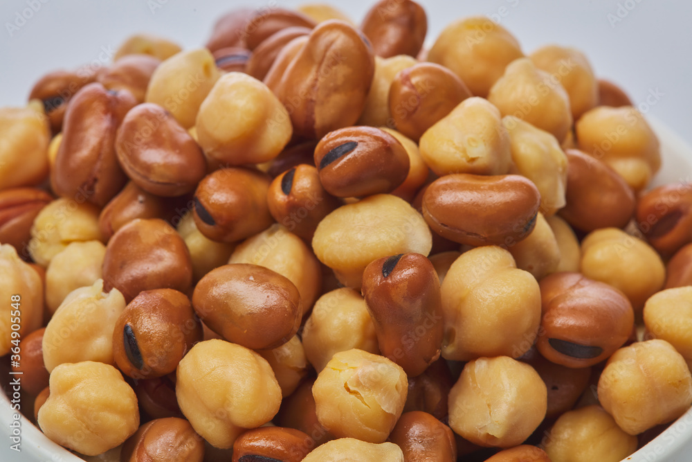 Chickpeas & fava beans (foul) on white background Chickpeas & fava beans (foul) on white background