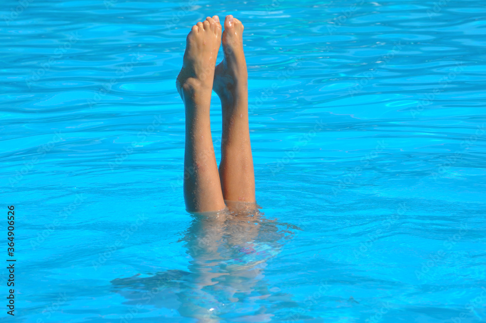 girl syncronized swimming