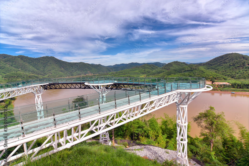 Beautiful Glass sky walk at Viewpoint new landmark Thailand skywalk, at Phra Yai Phu Khok Ngio Chiang Khan district, Loei Province, Mekong river Thailand and Laos PDR. of a popular tourist attraction