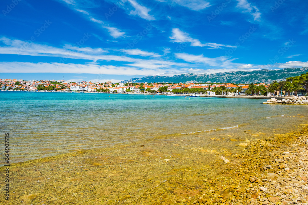 Croatia, town of Novalja on the island of Pag, marina and turquoise sea in foreground, tourist destination on Adriatic sea