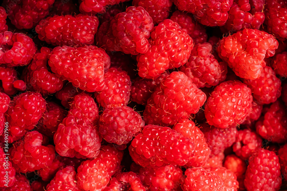 Close up texture background of raspberry berries Close up texture background of raspberry berries