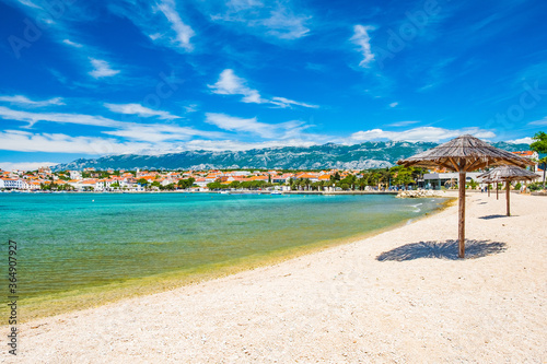 Fototapeta Naklejka Na Ścianę i Meble -  Adriatic sea shore in Croatia on Pag island, beautiful sand beach in town of Novalja
