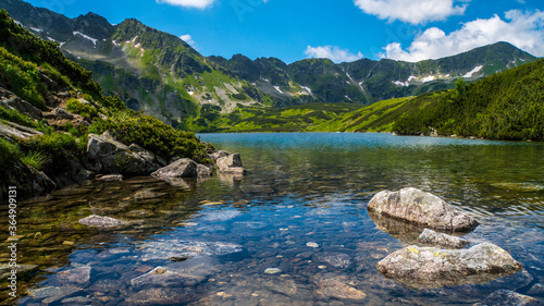 Rocks in a big pond in the Tatra Mountains