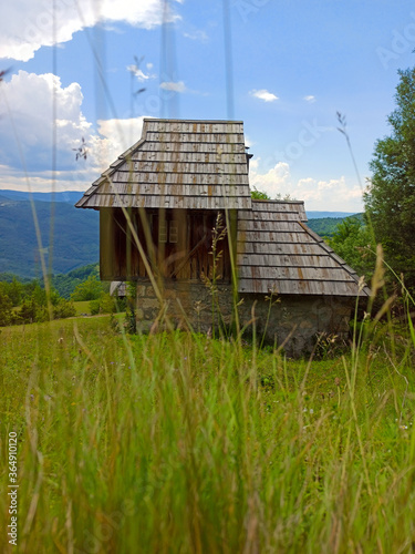 Old traditional house at Sopotnica village in Serbia photo