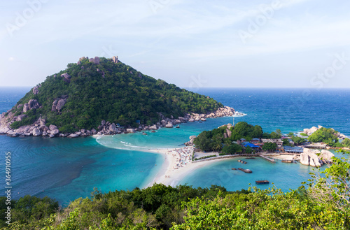 Aerial view of the small island of Koh Nangyuan in a sunny day with turquoise blue sea water, close to Koh Tao, Thailand 