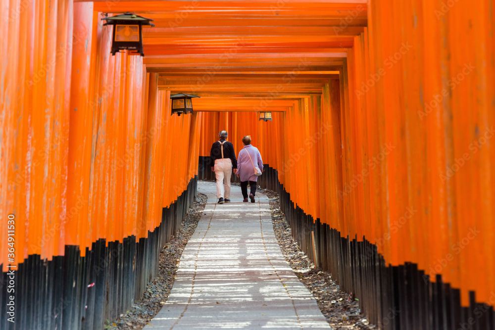 Red Torii Gate at Fushimi Inari taisha Shrine in Fushimi, Kyoto, Japan. Fushimi Inari Taisha is Kyoto's most important Shinto shrine and one of its most impressive attractions Red Torii Gate at Fushimi Inari taisha Shrine in Fushimi, Kyoto, Japan. Fushimi Inari Taisha is Kyoto's most important Shinto shrine and one of its most impressive attractions
