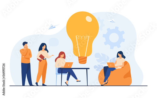 Business team meeting in office or co-working space. Colleagues sitting at desk, working with computer, discussing ideas for project together. Can be used for teamwork or cooperation concept.