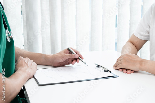Male doctors explain and recommend treatment after a male patient meets a doctor and receives results regarding illness problems. Medical and health care concepts