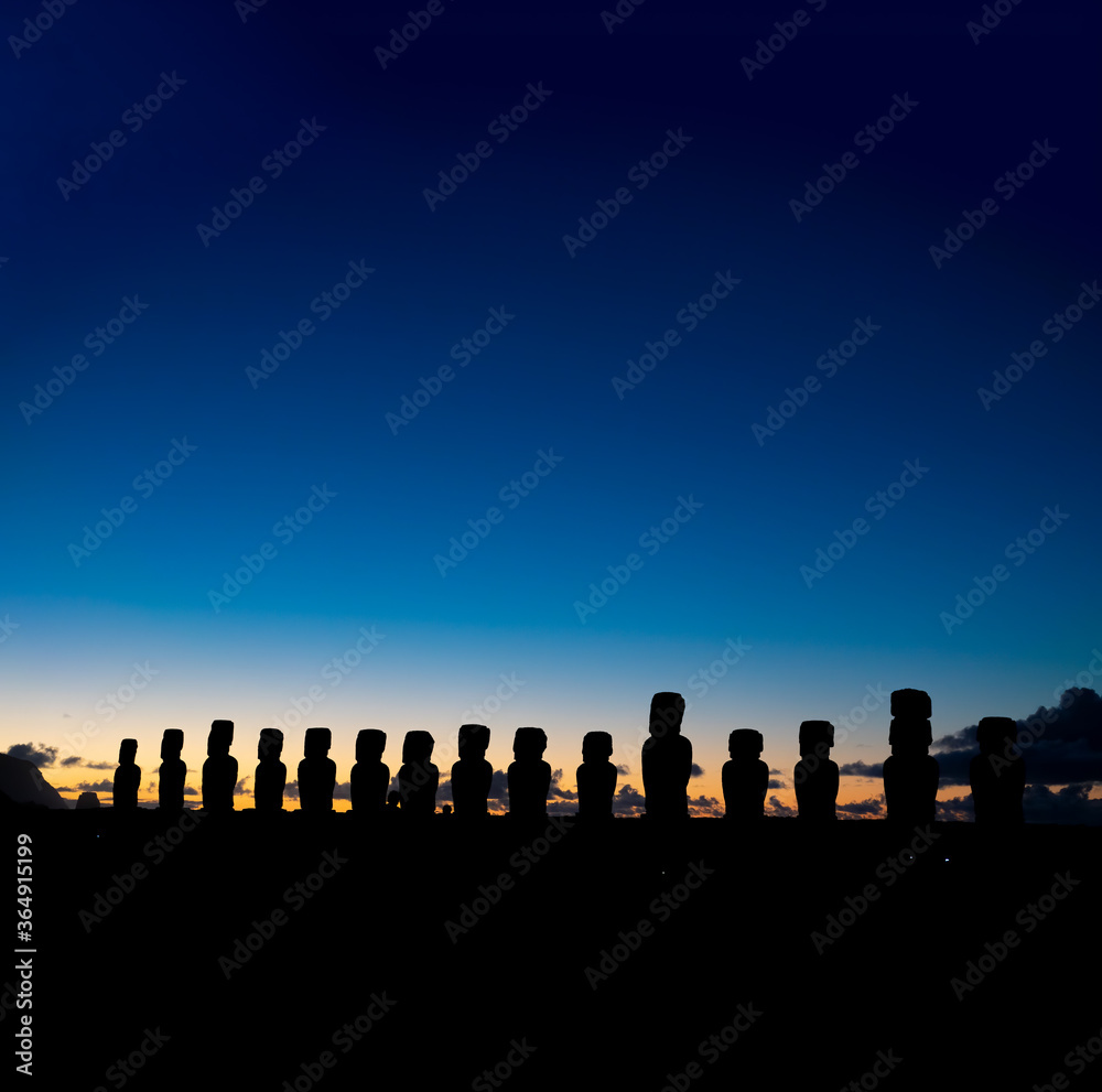 Spectacular moai platform silhouette at dawn