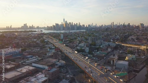 Aerial view of New York skyline from the Brooklyn train tracks during sunset photo