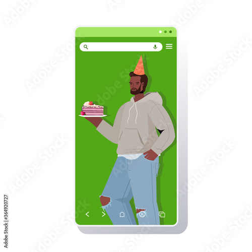 man in festive hat celebrating online birthday party african american guy in smartphone screen holding cake celebration self isolation quarantine concept portrait vertical vector illustration
