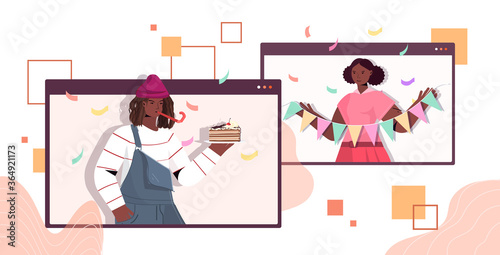 man woman in festive hats celebrating online birthday party african american couple in computer windows having fun celebration self isolation virtual meeting concept portrait horizontal vector