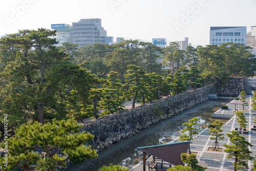 Beautiful scenic view from The Ushitora yagura at Takamatsu Castle (Tamamo Park) in Takamatsu, Kagawa, Japan. photo