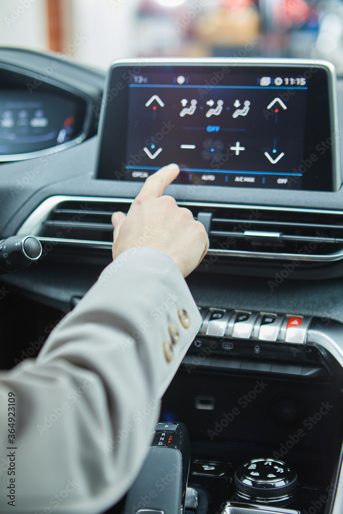 the driver controls the air conditioning in a modern electric car the driver controls the air conditioning in a modern electric car