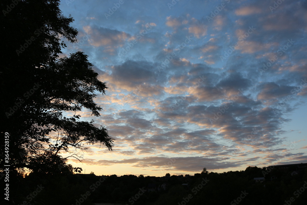 Obraz premium Sunset colored clouds in the sky