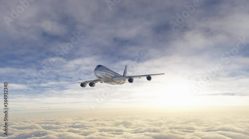 Big jet airplane flying over the sky in beautiful sunrise light. Aerial view of plane above the clouds. Footage in 4K, 16 bit depth