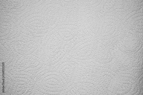 Texture of kitchen paper. With an embossed pattern of a butterfly.