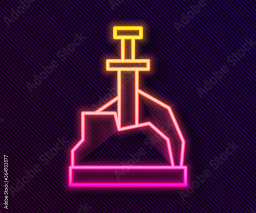 Glowing neon line Sword in the stone icon isolated on black background. Excalibur the sword in the stone from the Arthurian legends. Vector.