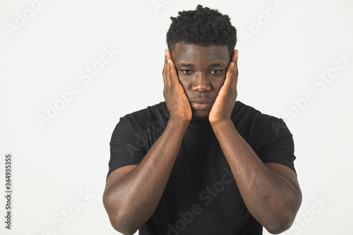 handsome young african man over white background