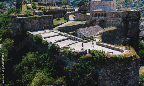 Gjirokaster Castle aerial view at the historical UNESCO protected town of Gjirokaster, Albania. 